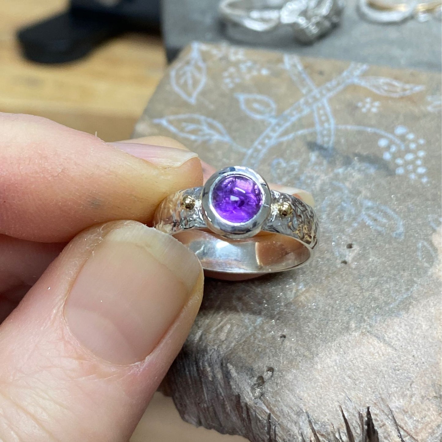 Purple gemstone ring