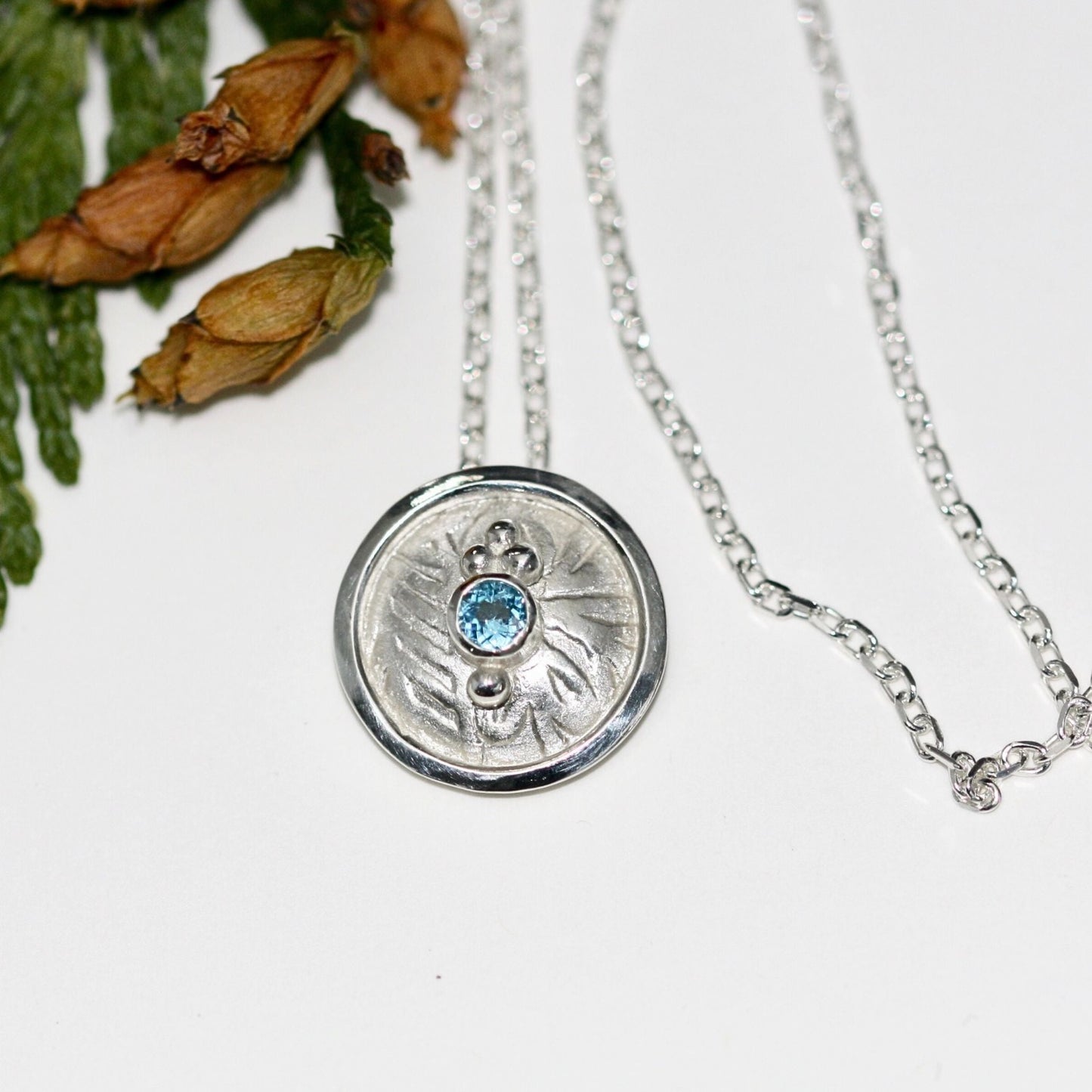 Boudicca Silver Shield Pendant with blue topaz