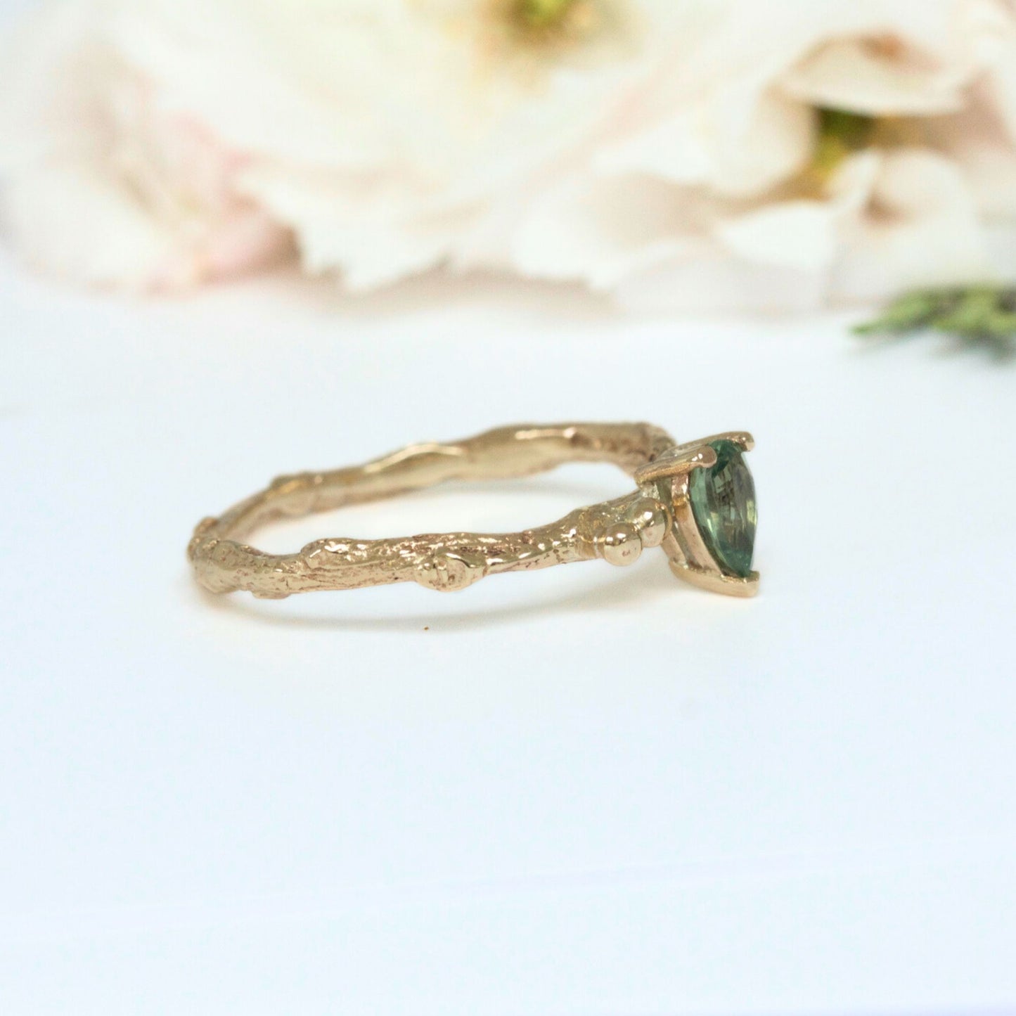 green sapphire engagement ring