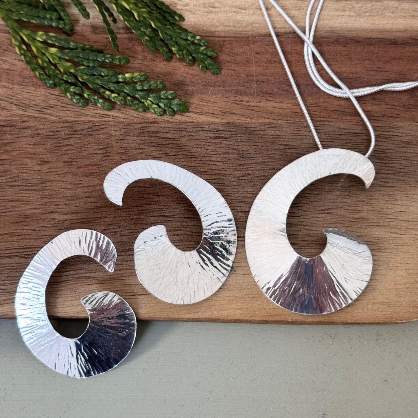 Nisha Sterling Silver Plannished Swirl Pendant