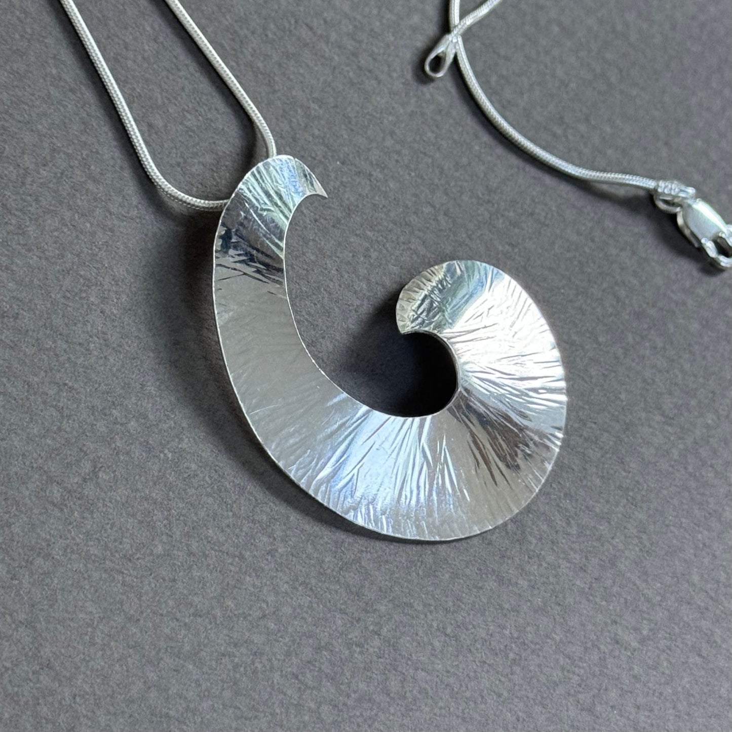 Nisha Sterling Silver Plannished Swirl Pendant