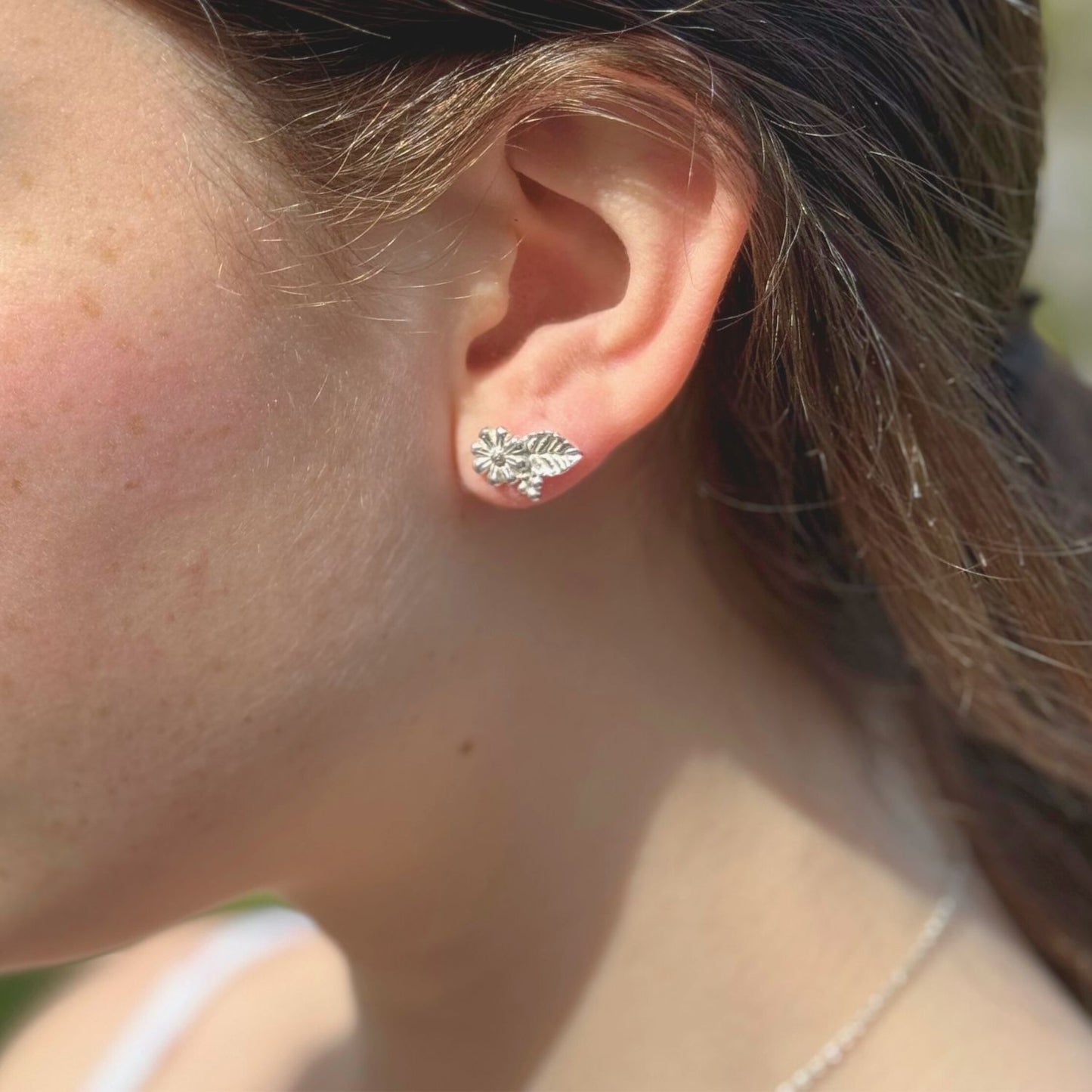 dainty silver flower studs