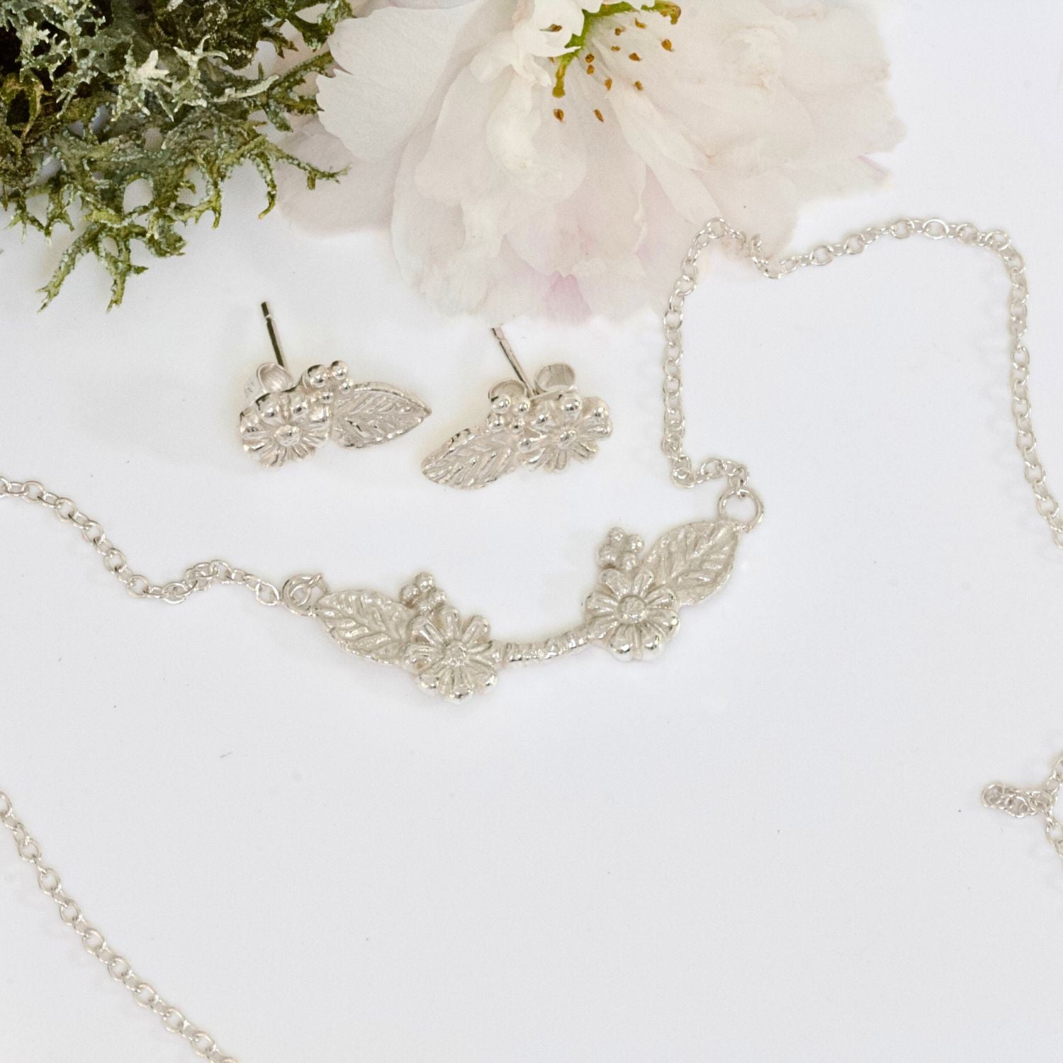 silver daisy necklace and earring set