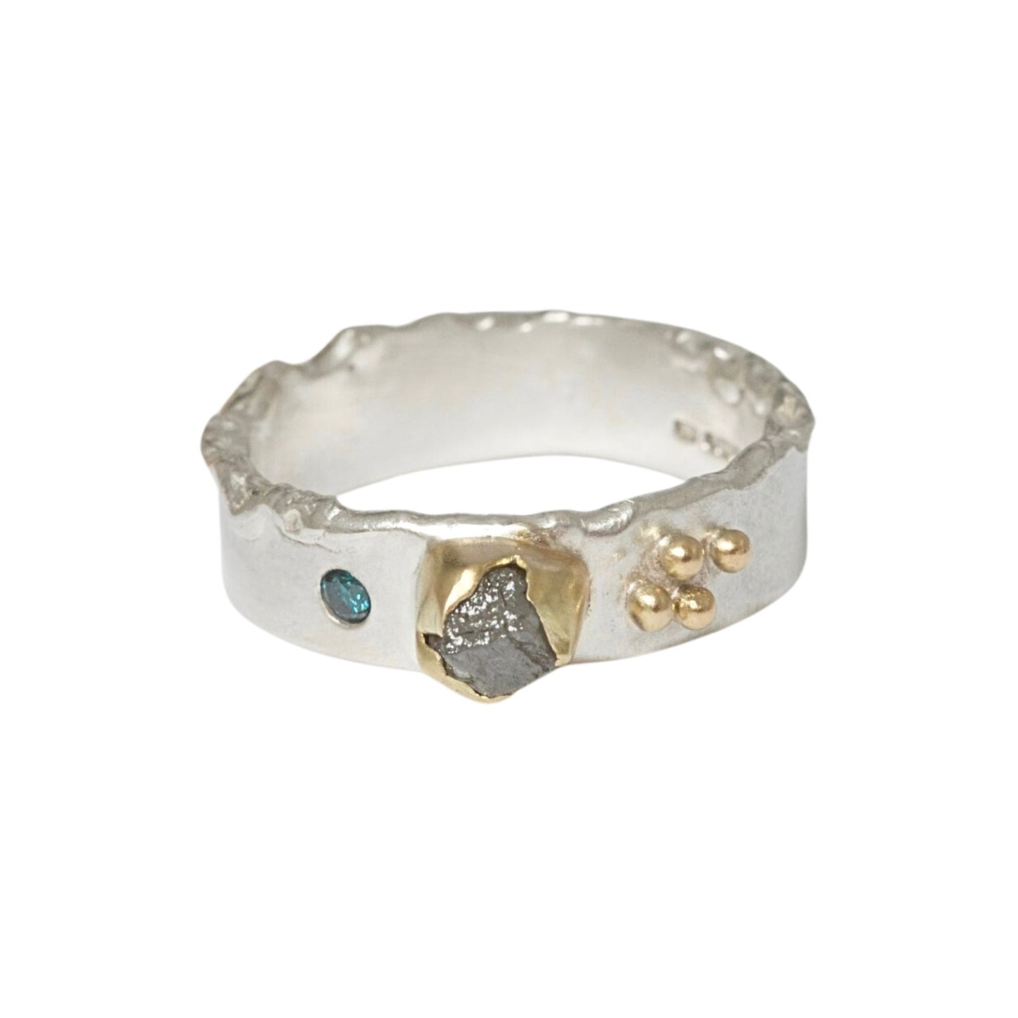 Rough Natural Grey diamond band ring. Sterling silver band set with a natural raw uncut diamond in 18ct yellow gold and a blue brilliant cut diamond. Alternative engagement or wedding ring.