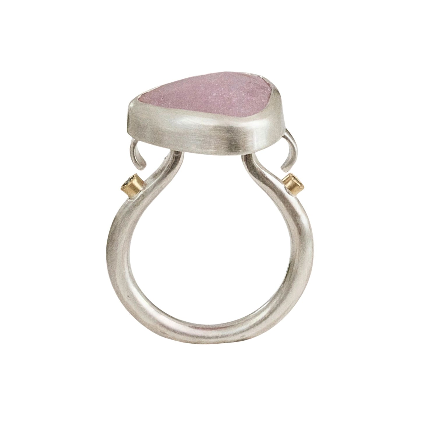 Handmade sculptural baby pink sapphire ring handmade in satin finished silver with green diamonds set in 18ct gold.
