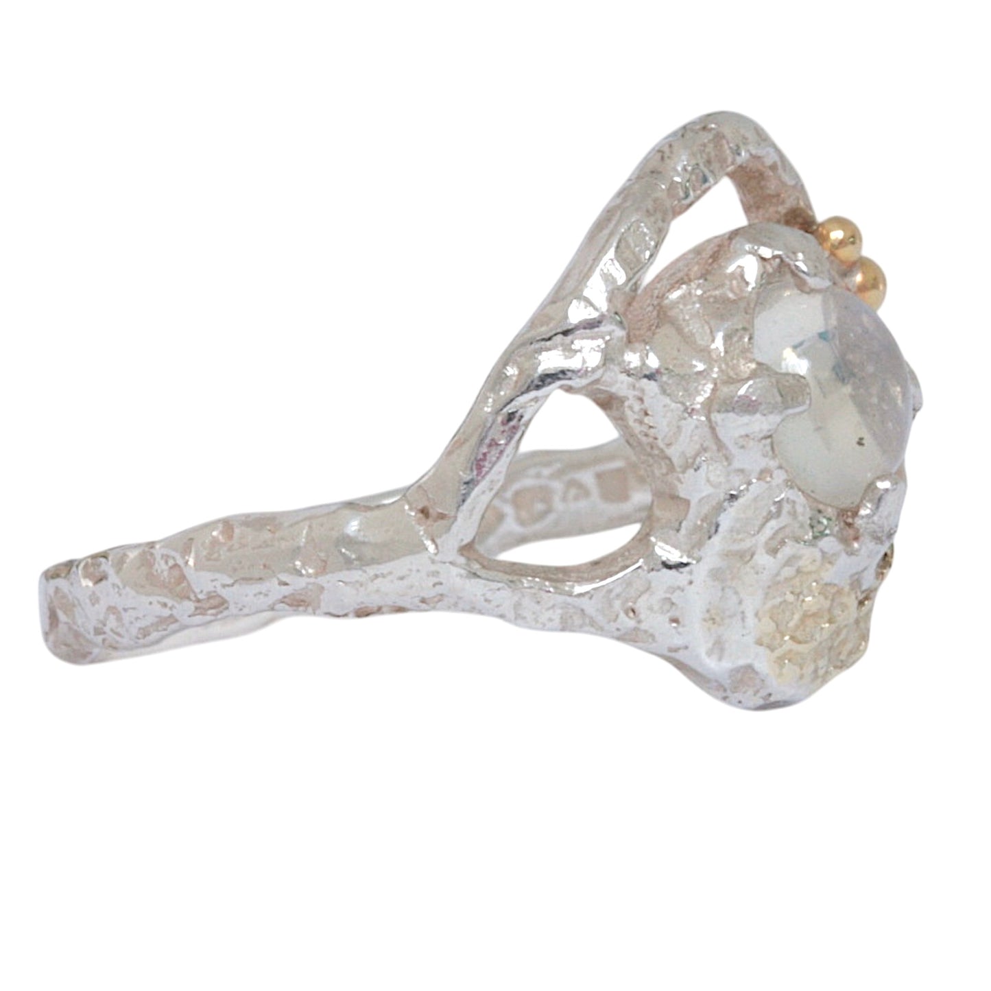 Elegant sterling silver ring showcasing a glowing 5mm blue moonstone, with two gold accent balls and fused 18ct gold details along a textured, flowing band.