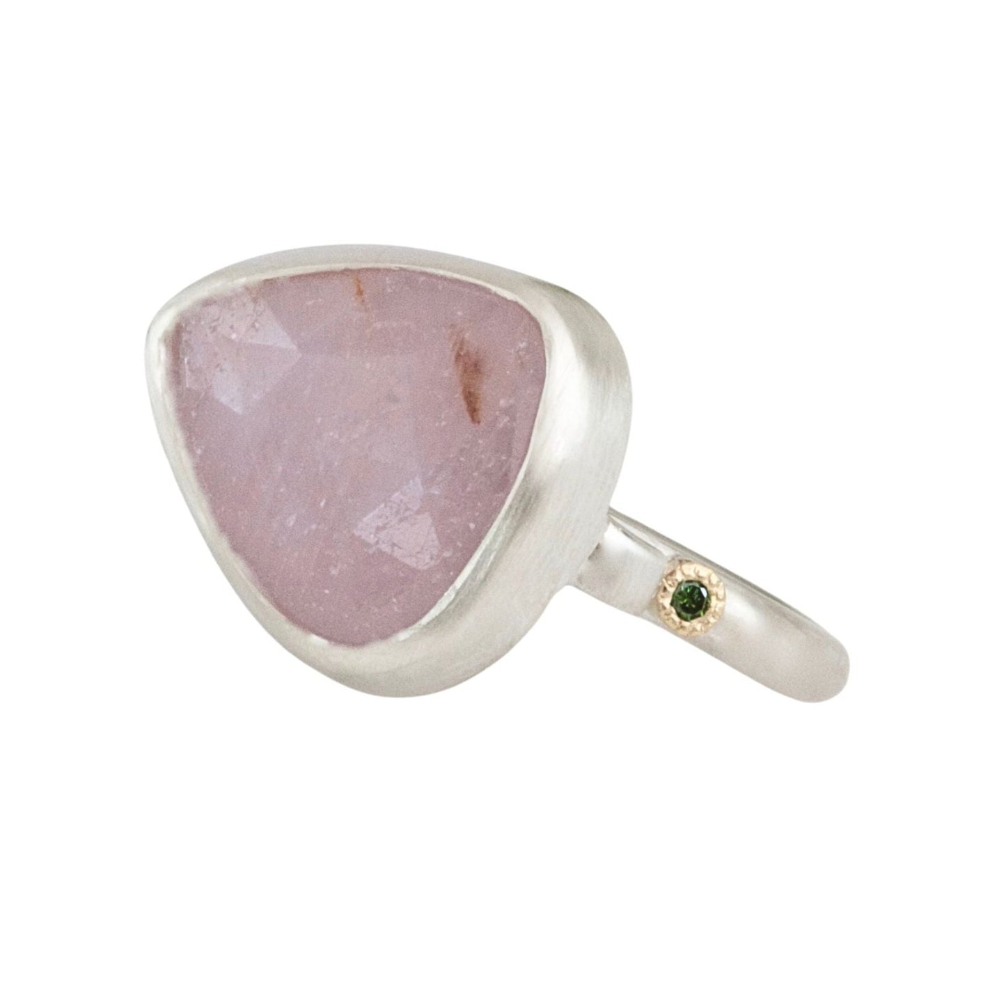 Handmade sculptural baby pink sapphire ring handmade in satin finished silver with green diamonds set in 18ct gold.