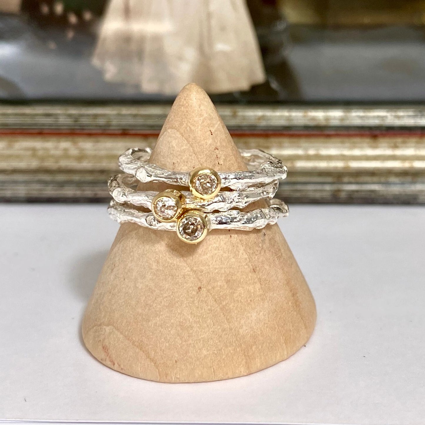 silver and gold diamond twig rings