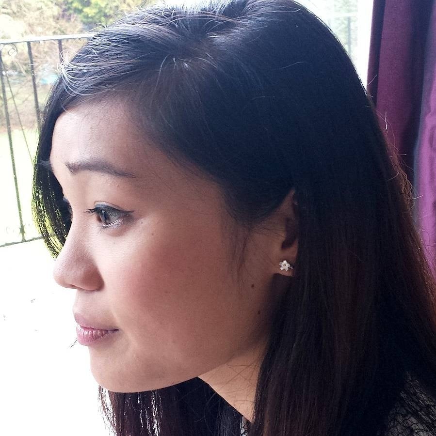 Oxidised silver and 18 carat gold flower earrings. Mixed metal Cherry Blossom floral stud earrings.
