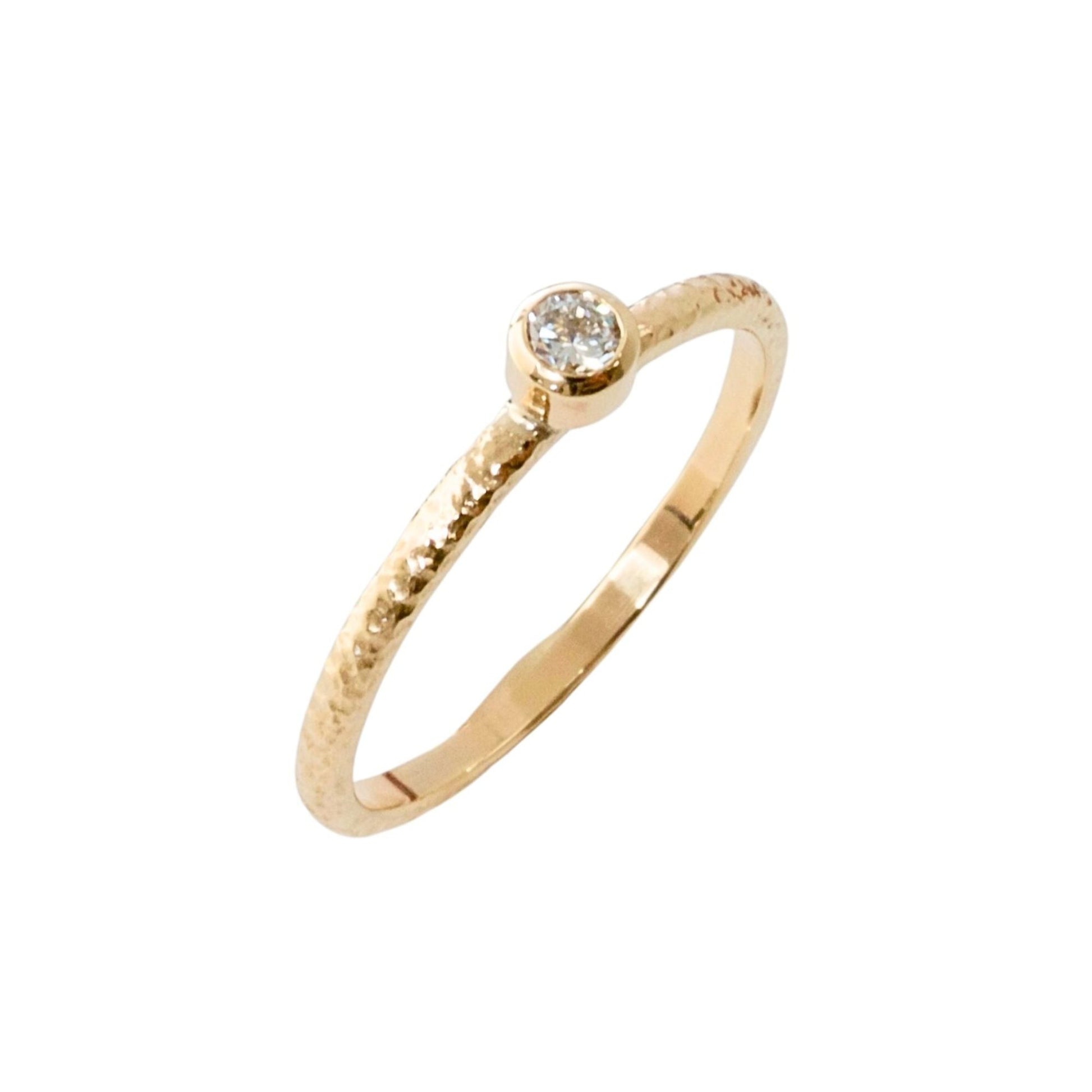 Textured 18ct gold slim, skinny ring with a bezel set 0.10ct natural diamond.