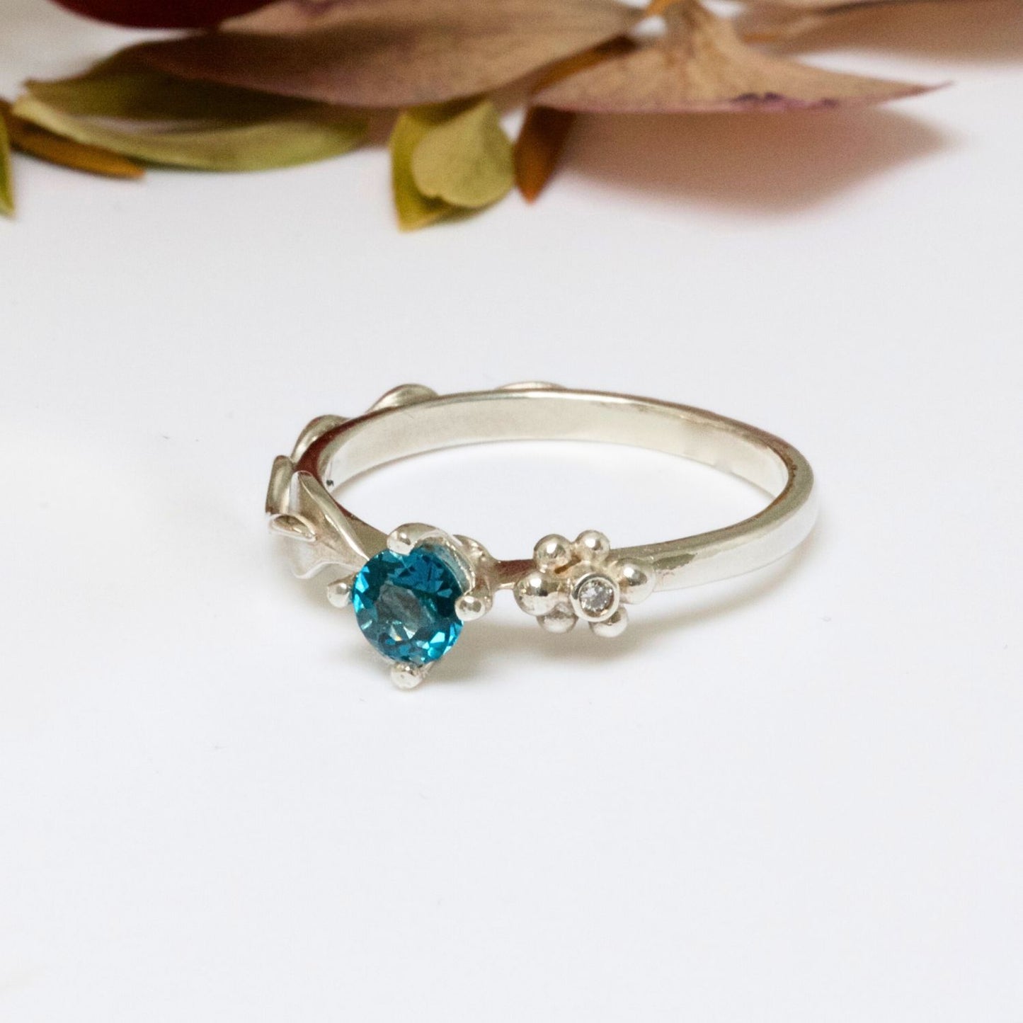 blue topaz silver nature ring