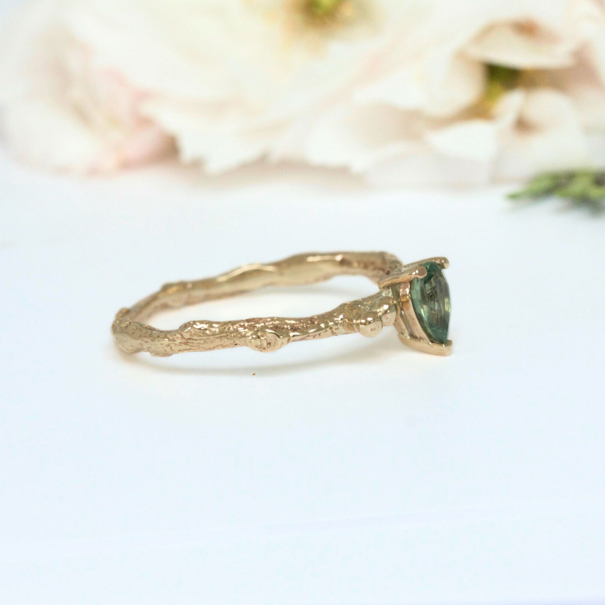 green sapphire engagement ring