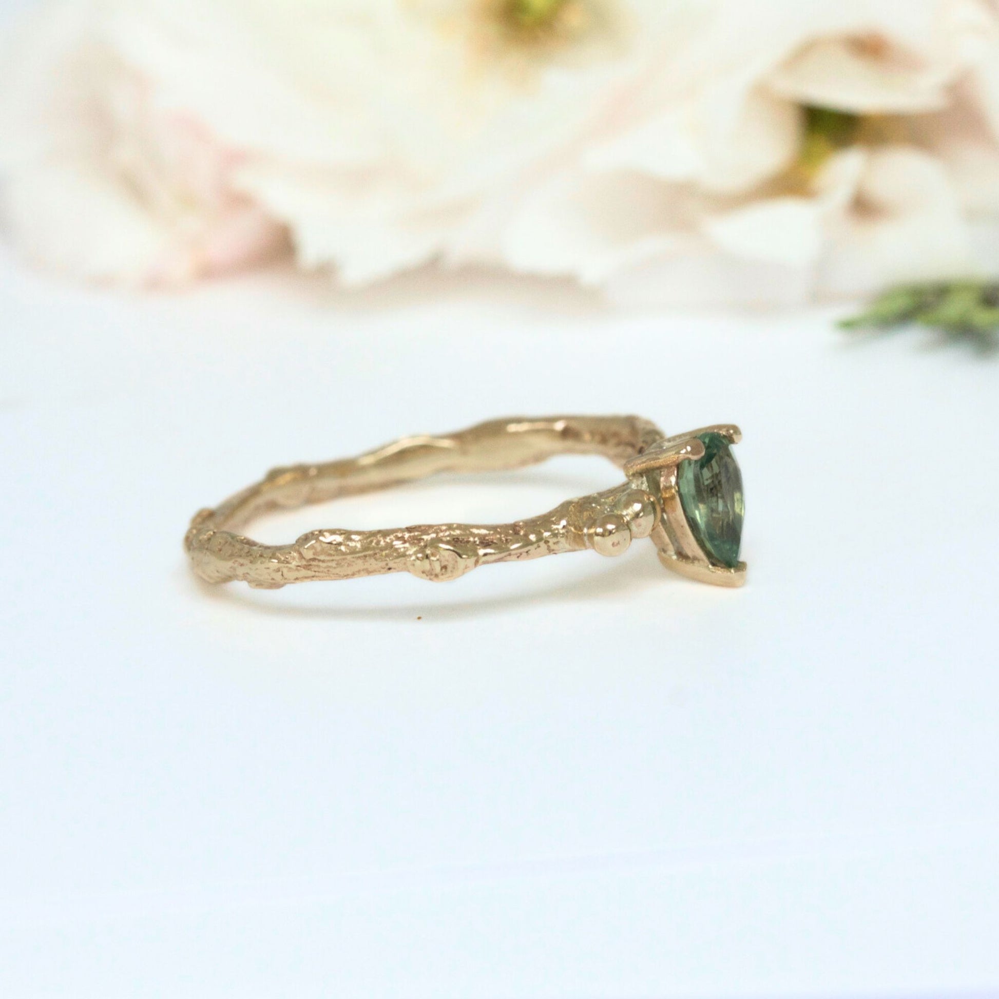 green sapphire engagement ring