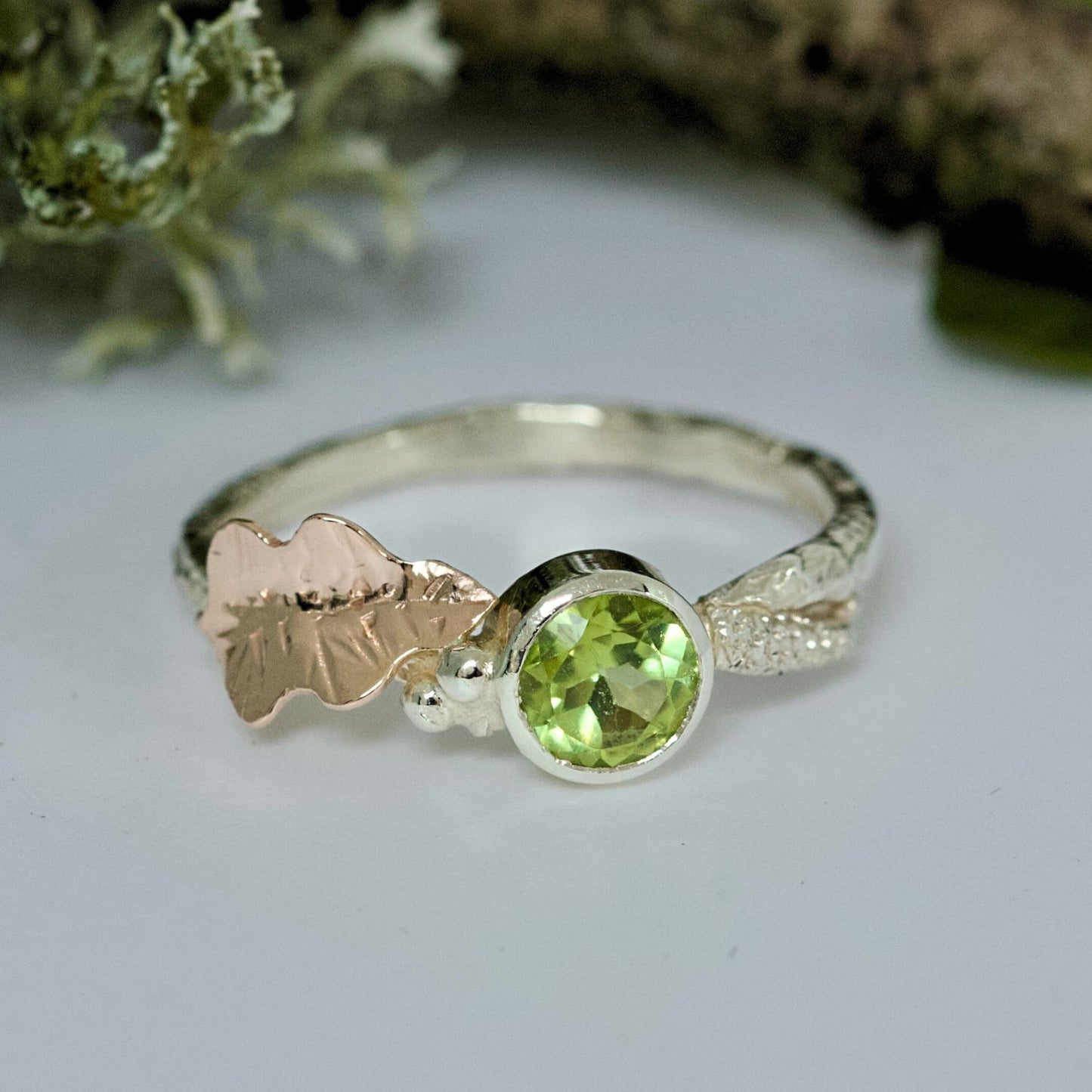 Peridot white and rose gold nature ring