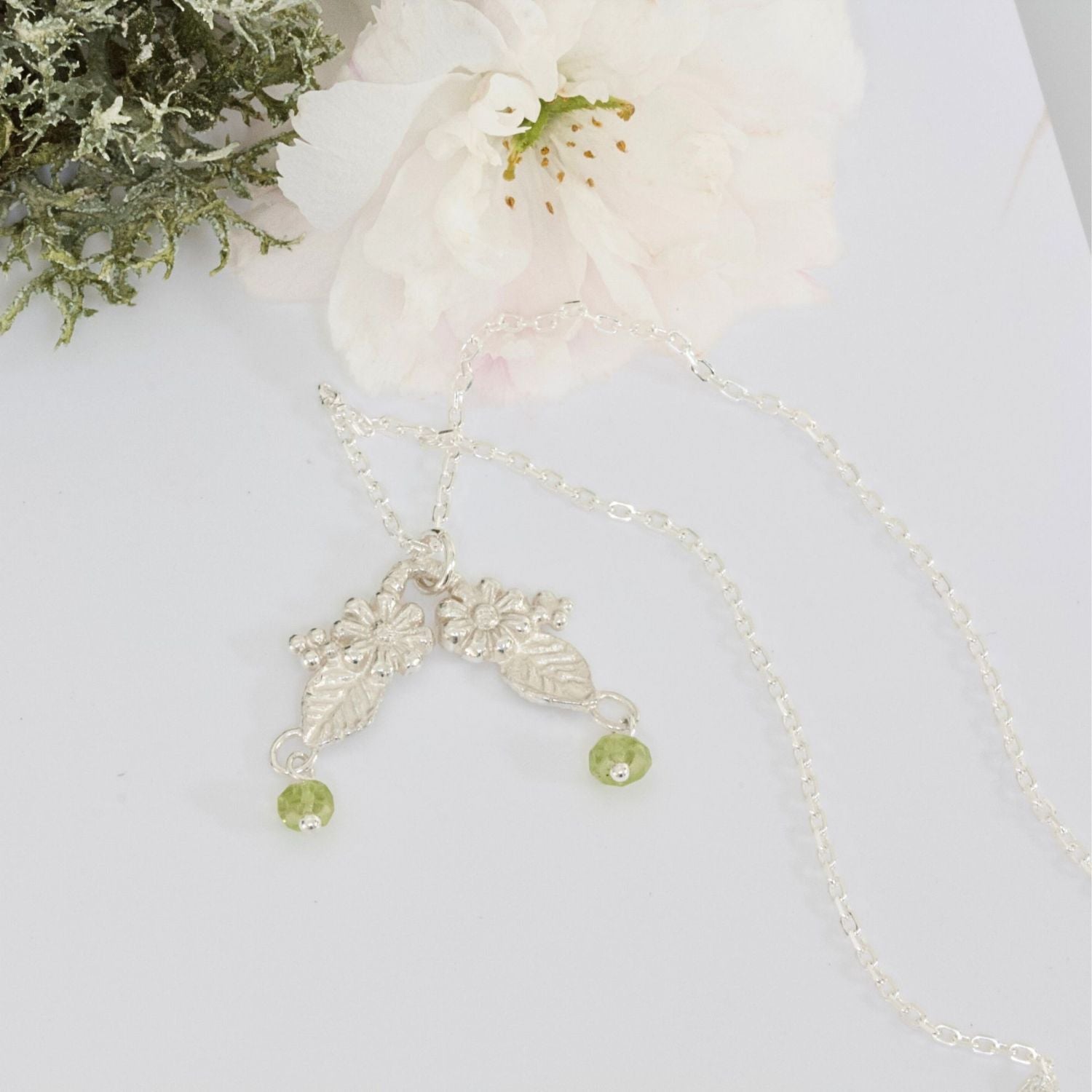 peridot silver flower and leaf pendant