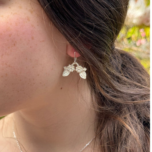 silver elvish flower earrings