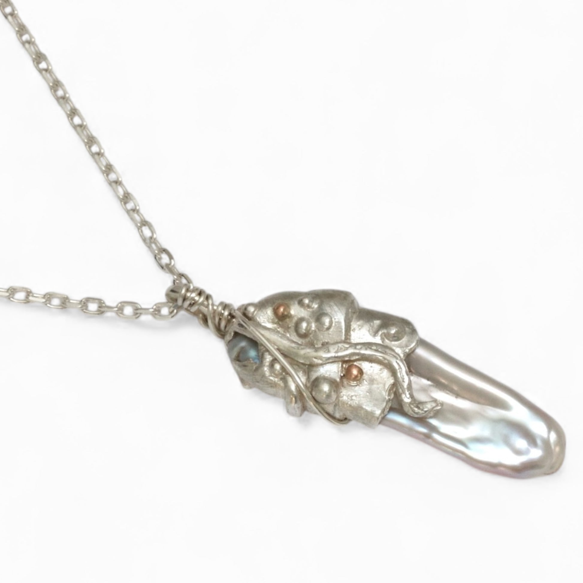 Keshi pearl silver pendant.