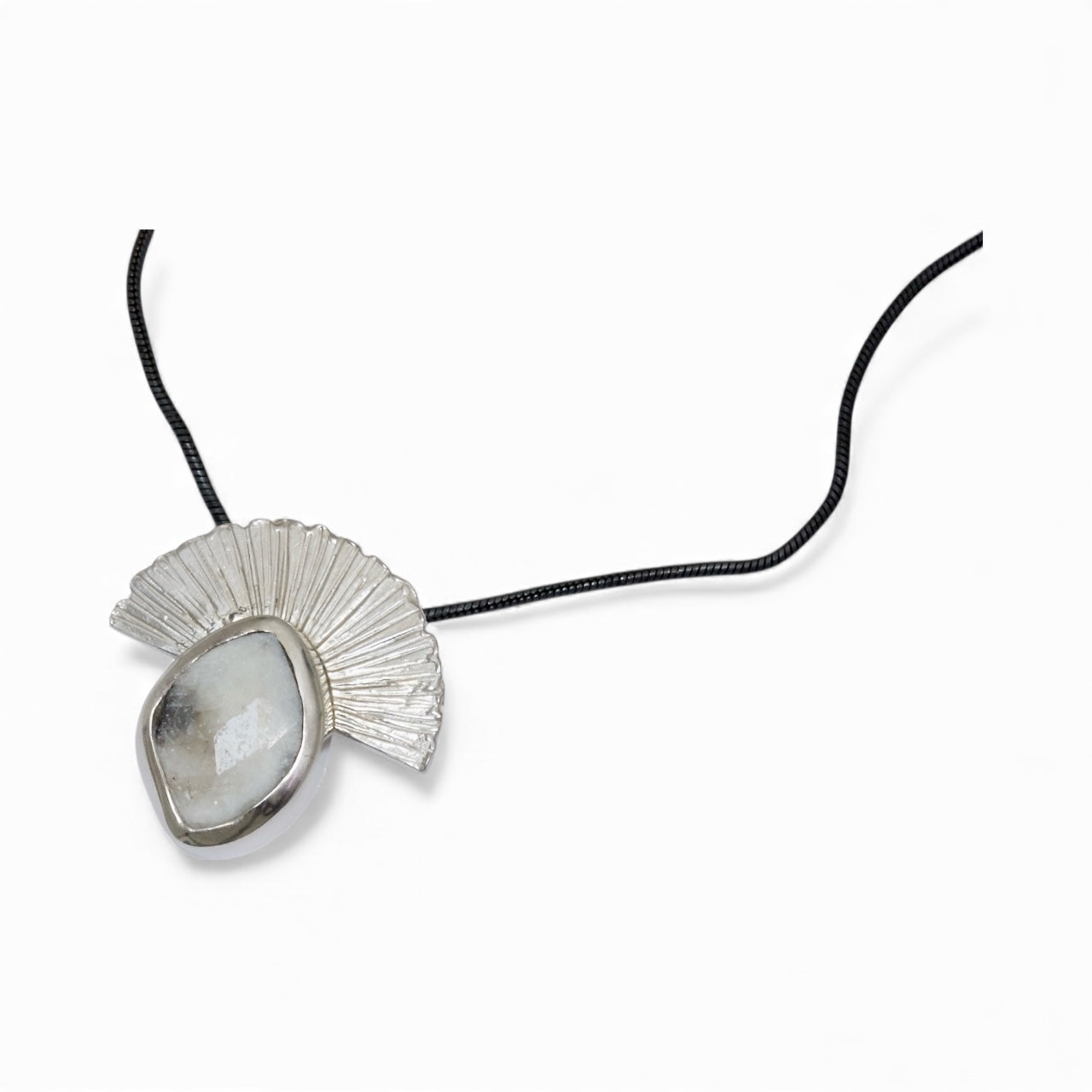 Monochrome toned handmade silver pendant on an oxidised silver snake chain.