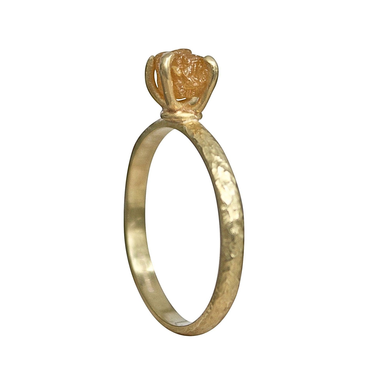 textured 18ct gold yellow engagement ring with a claw set natural rough uncut orange brown diamond.