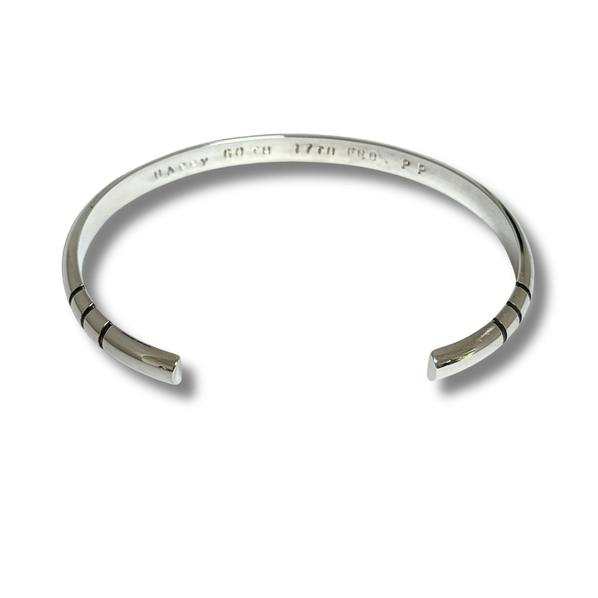 Handmade D shaped sterling silver unisex cuff bangle with hand stamped personalised text.