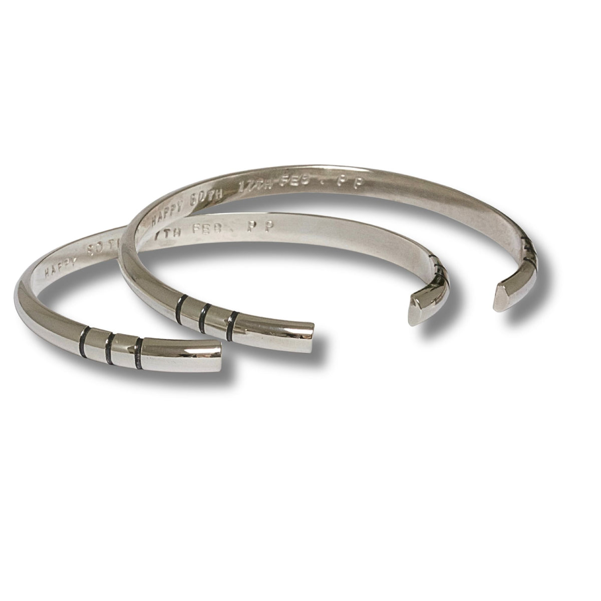 Handmade D shaped sterling silver unisex cuff bangles stamped with personalised message.