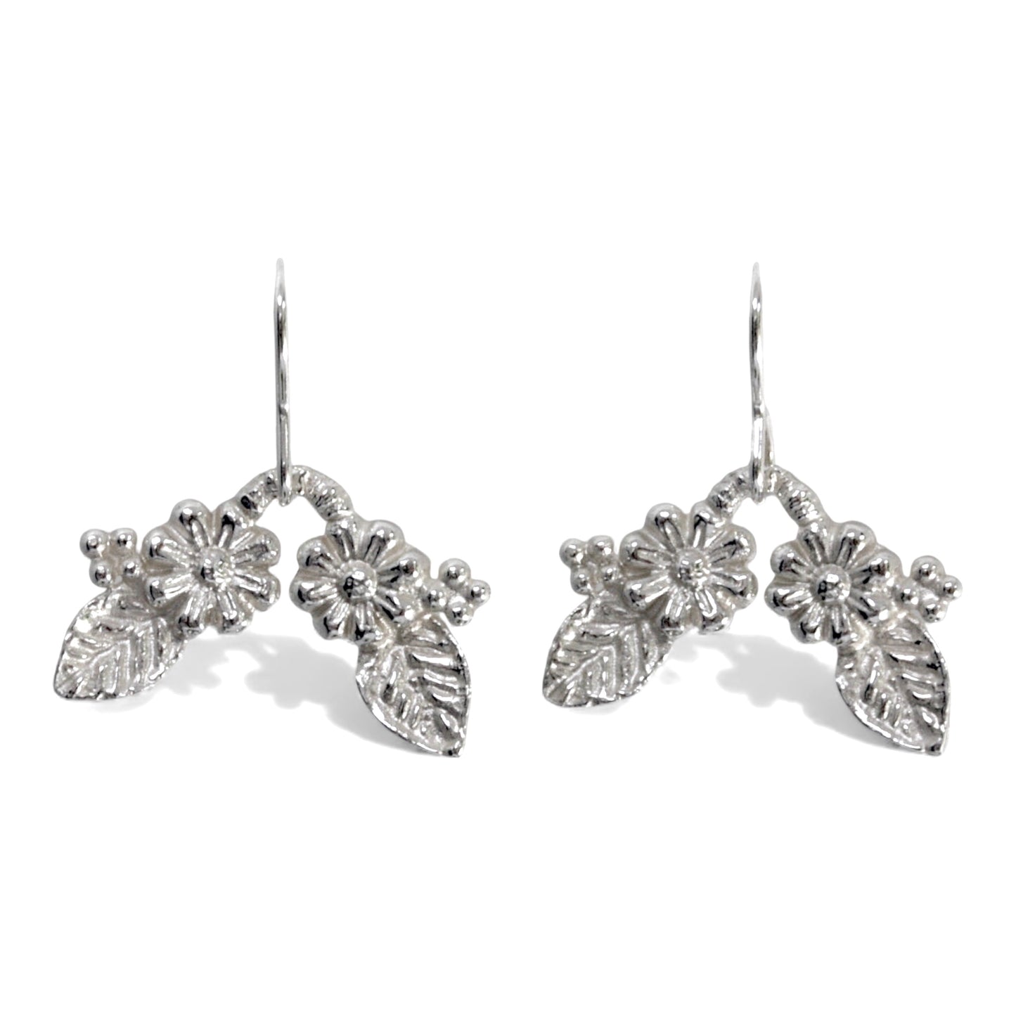 silver drop flower and leaf earrings.