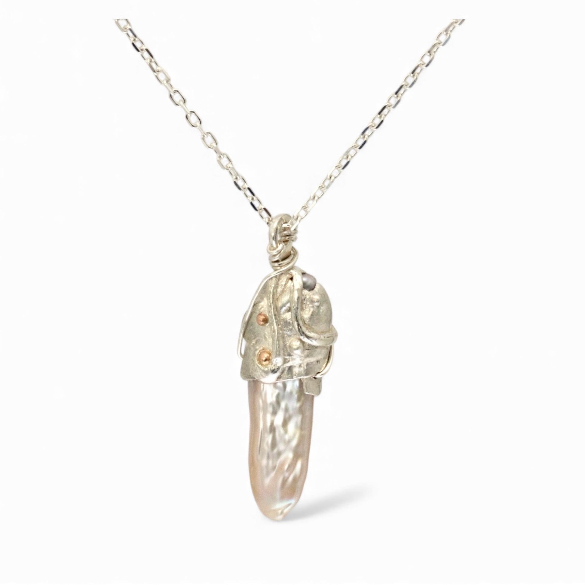 unique handmade sterling silver artisan pendant set with a keshi pearl.