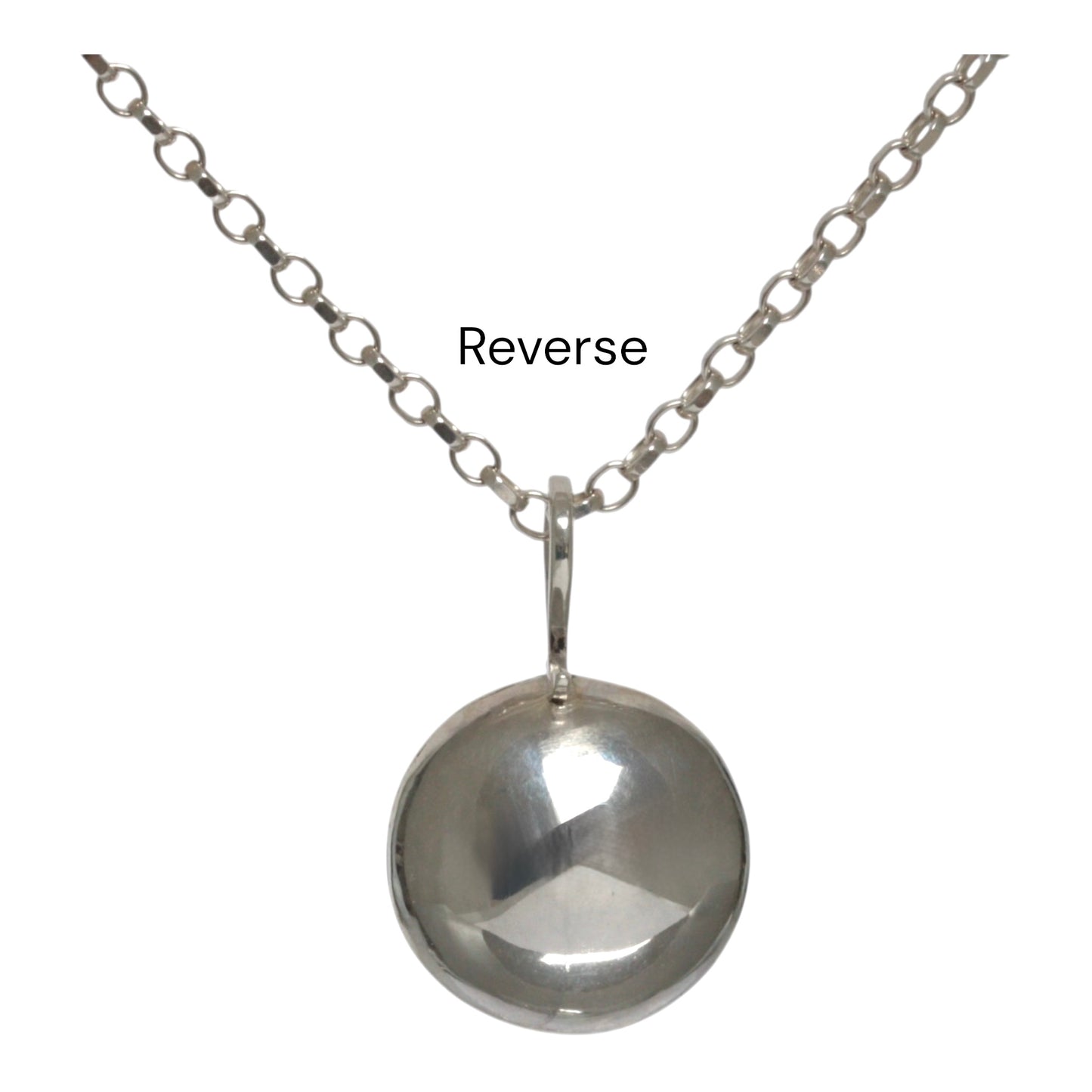 Reticulated silver necklace with salt and pepper diamond set in 18 carat gold.