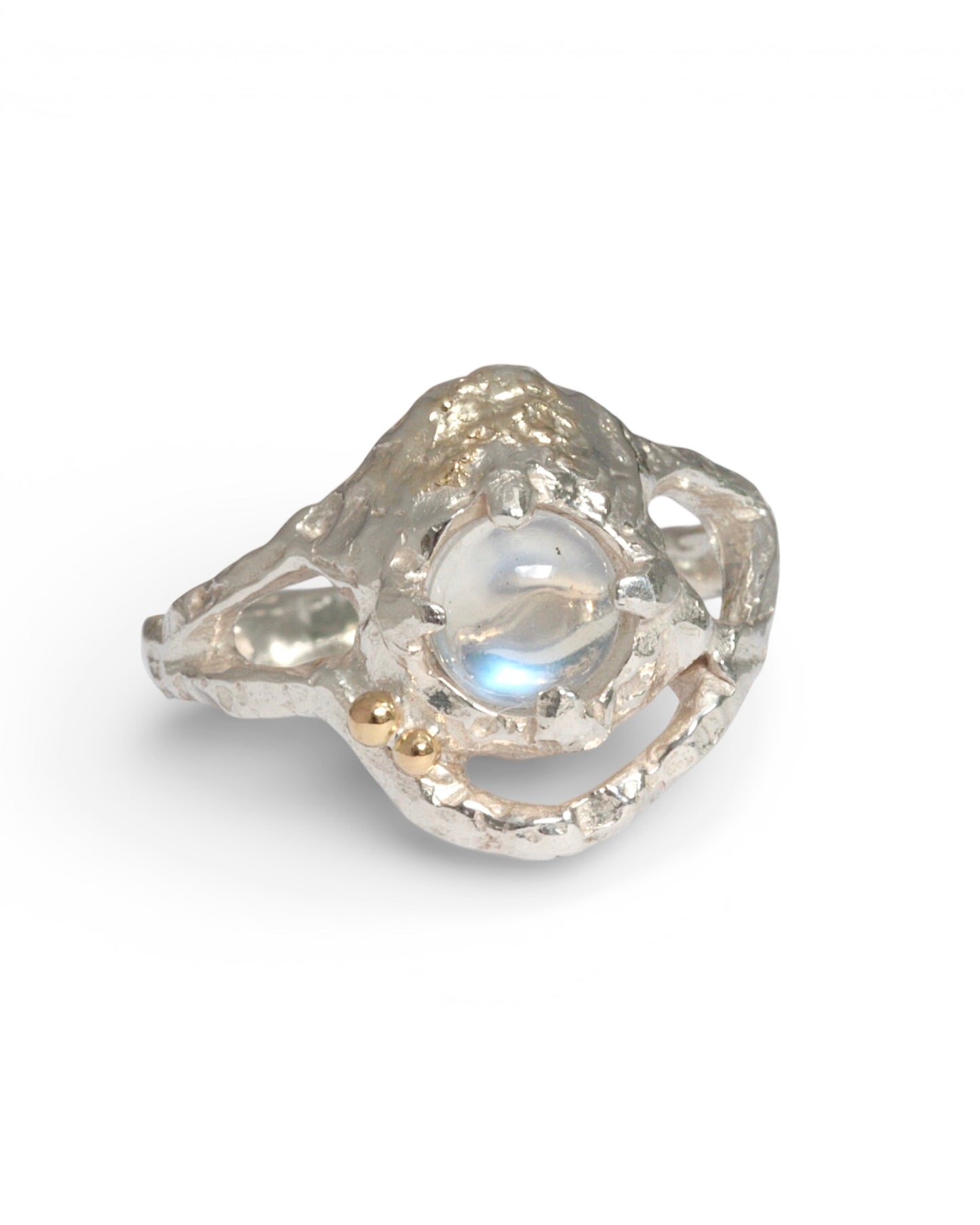 Textured silver ring featuring a luminous blue moonstone, complemented by 18ct gold accent balls and subtle fused gold accents, highlighting its hand-carved design.