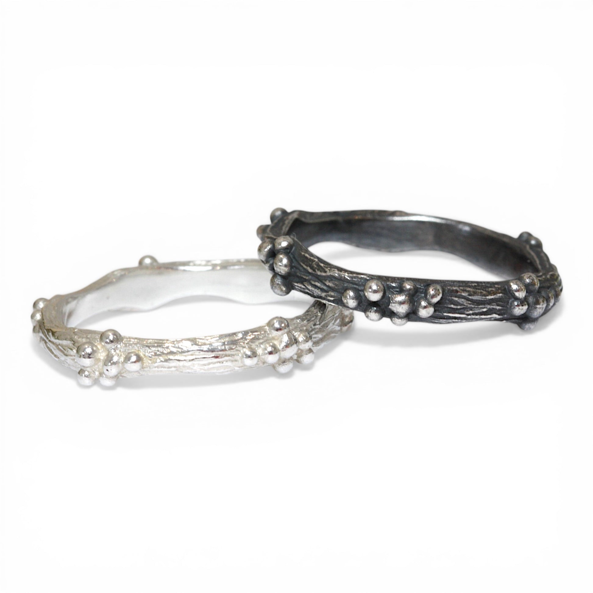 Silver and oxidised silver berry cluster rings