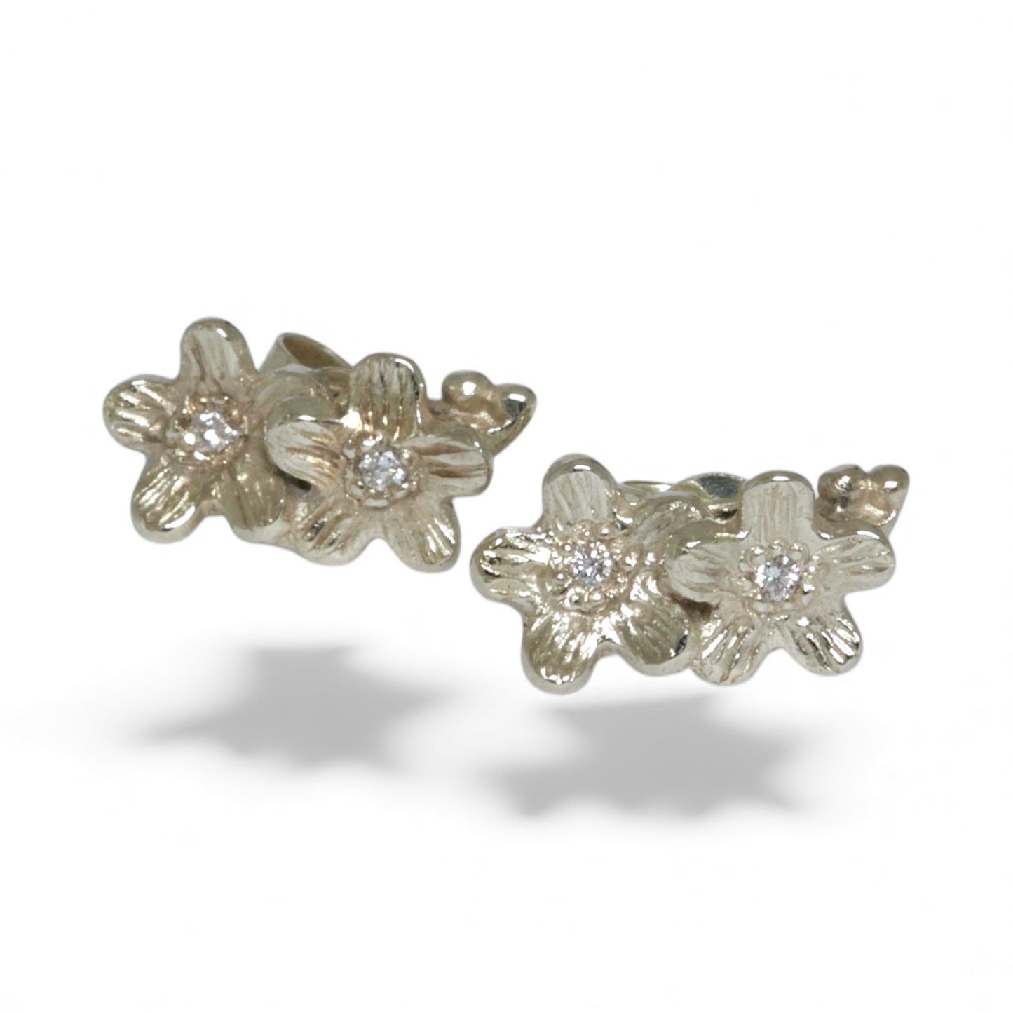 Tiny 9 carat white gold diamond stud flower earrings
