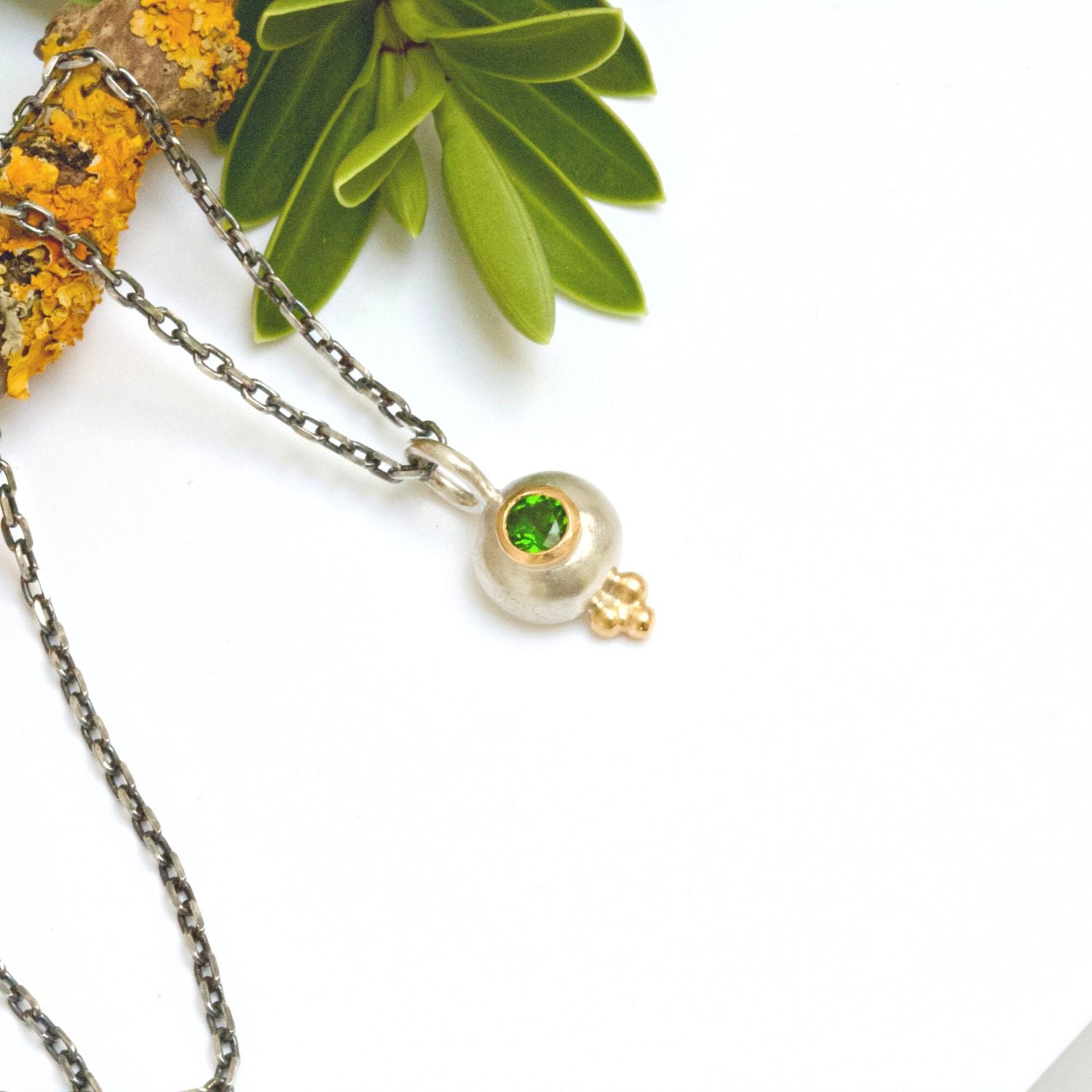 green diopside nugget pendant, silver and 18ct gold