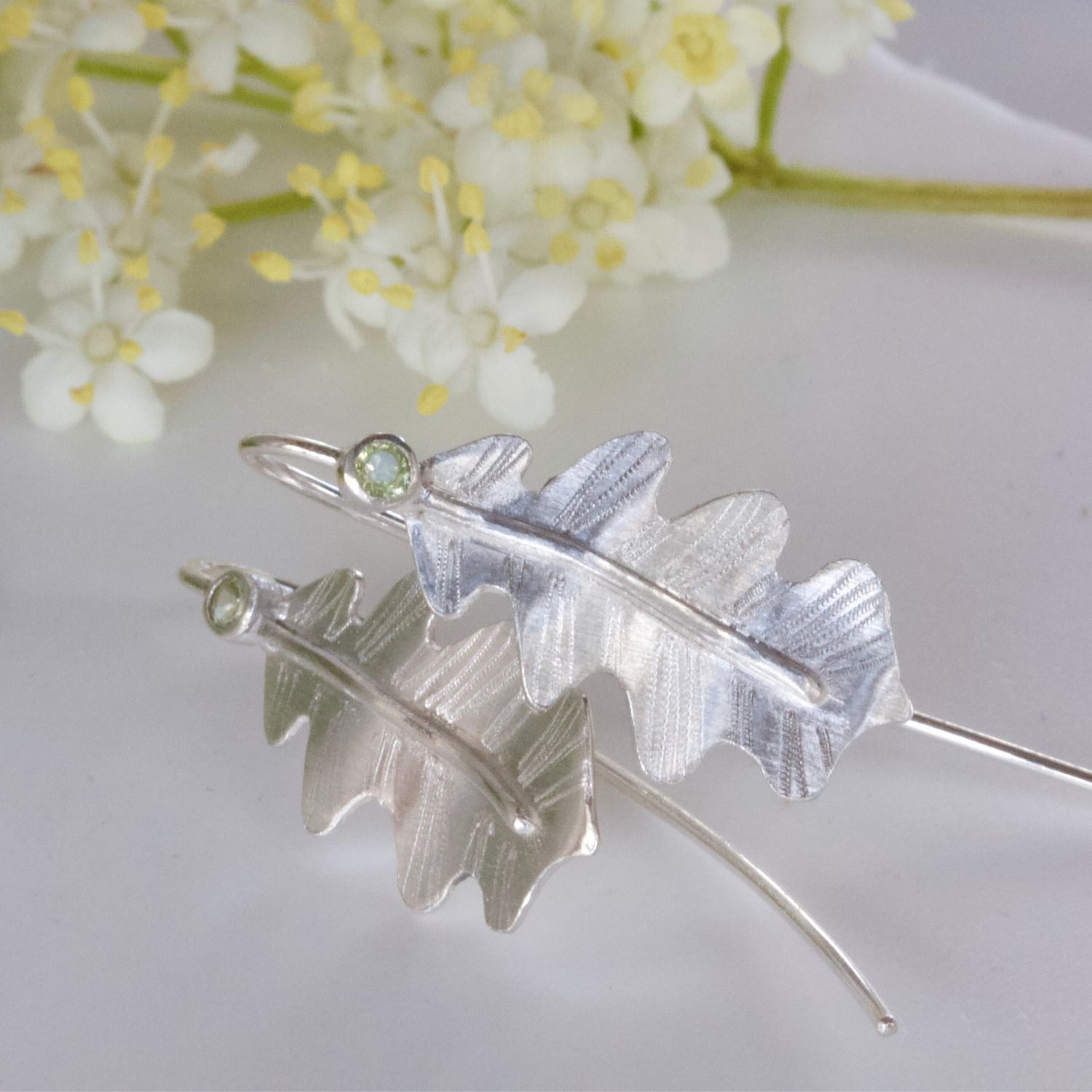 peridot oak leaf earrings