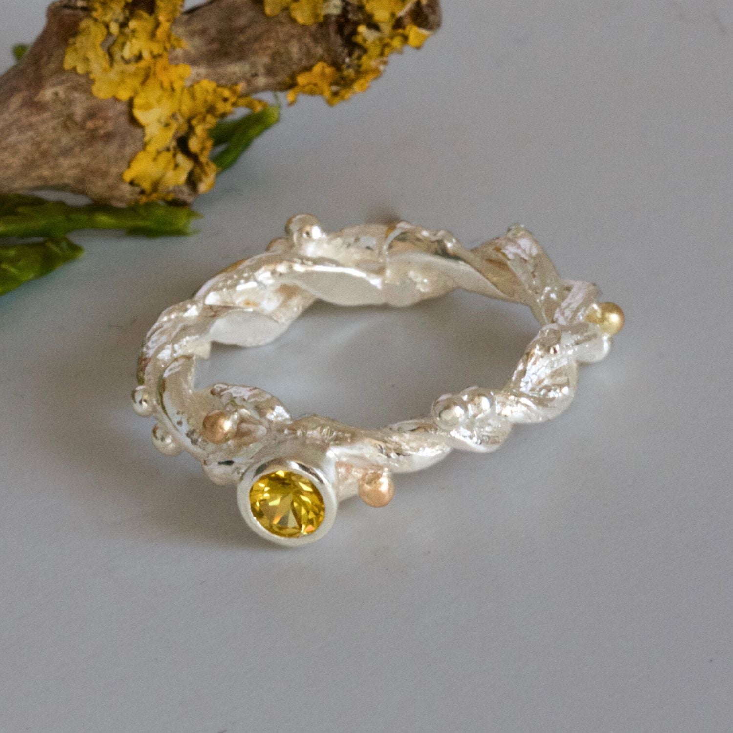 yellow sapphire entwined forest ring
