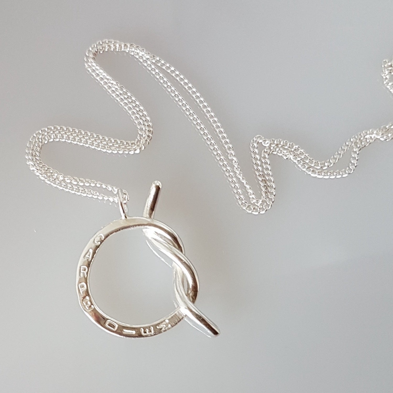 personalised knot necklace on a sterling silver chain