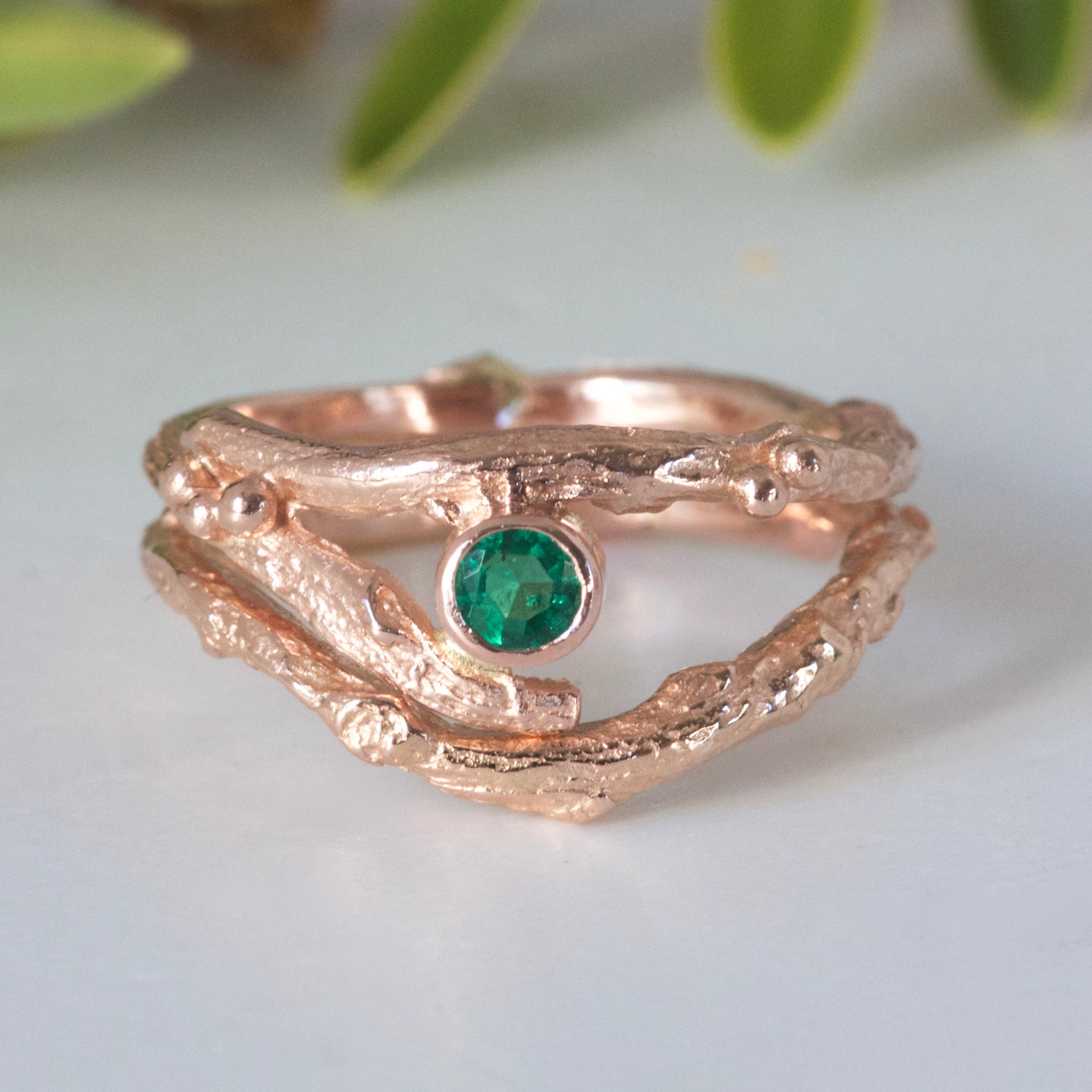 rose gold and emerald twig rings