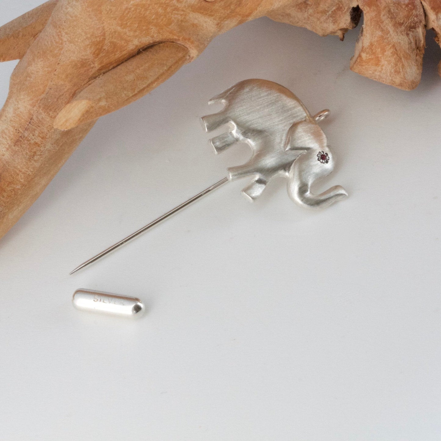 silver trunk up elephant pin