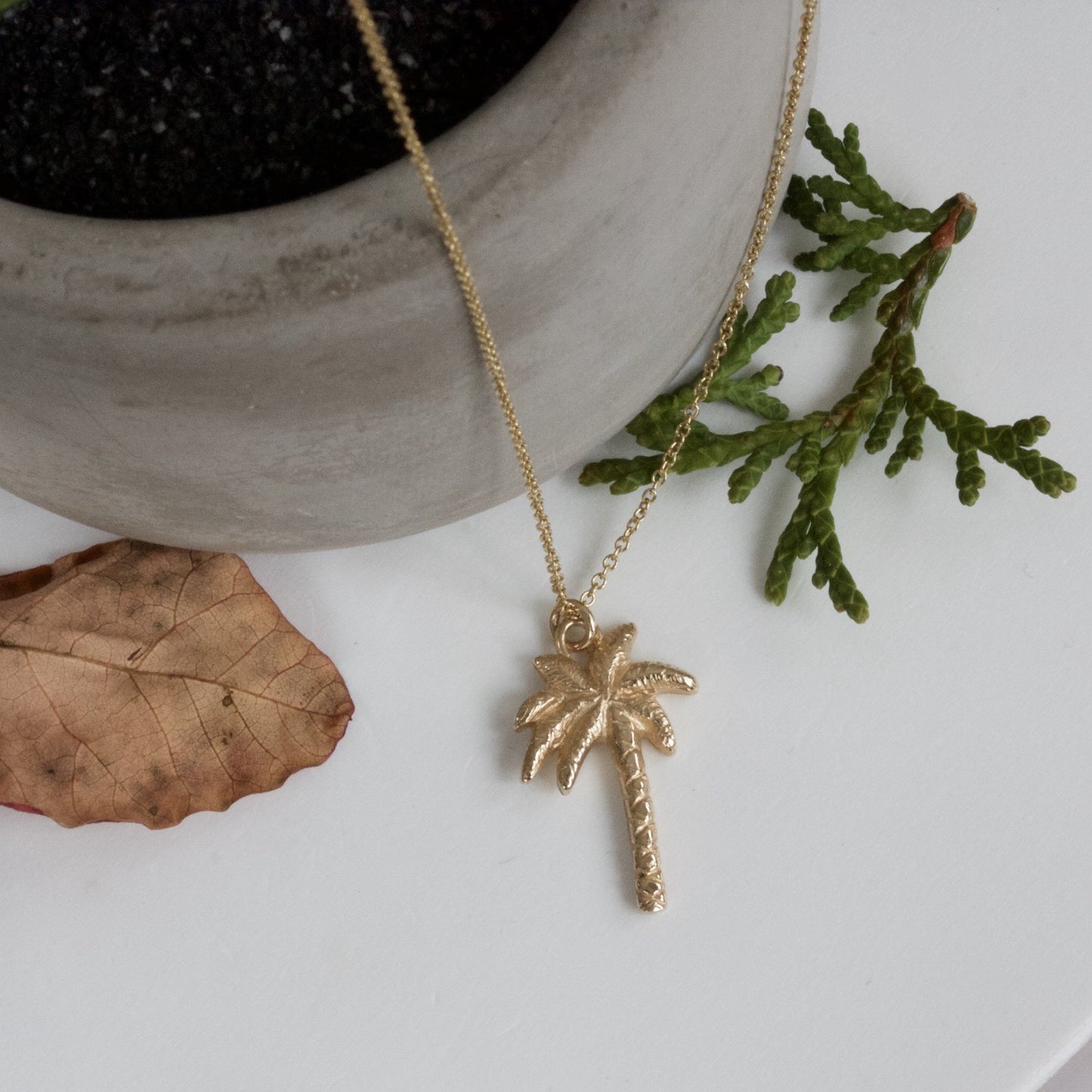 solid gold palm tree pendant