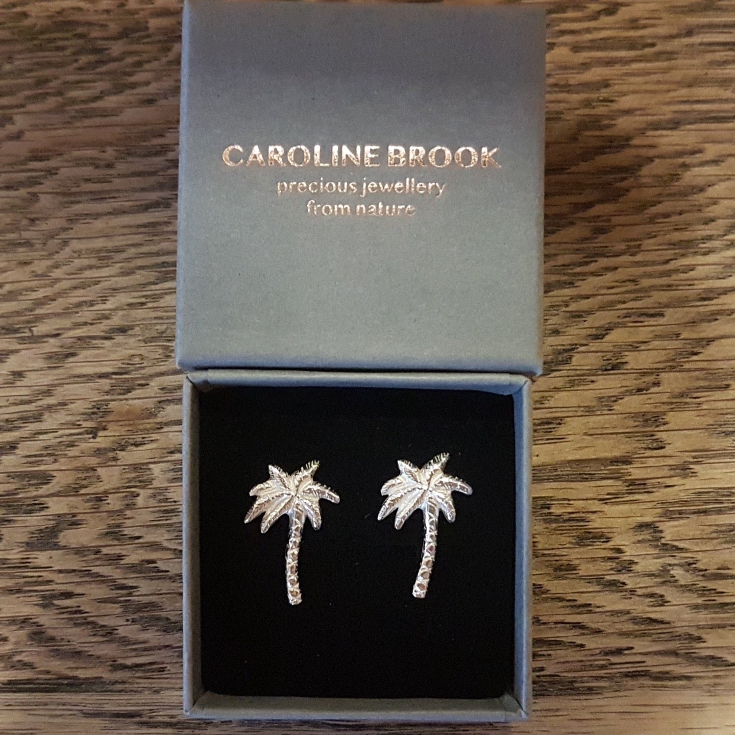 silver palm tree stud earrings